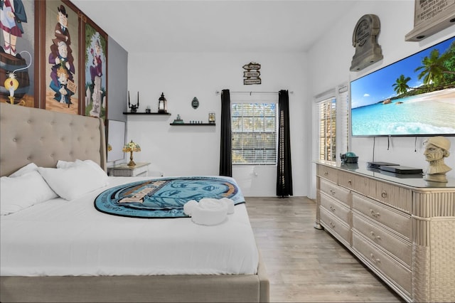 bedroom featuring light wood-type flooring