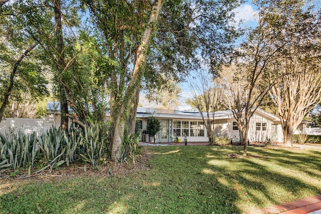 exterior space with a lawn