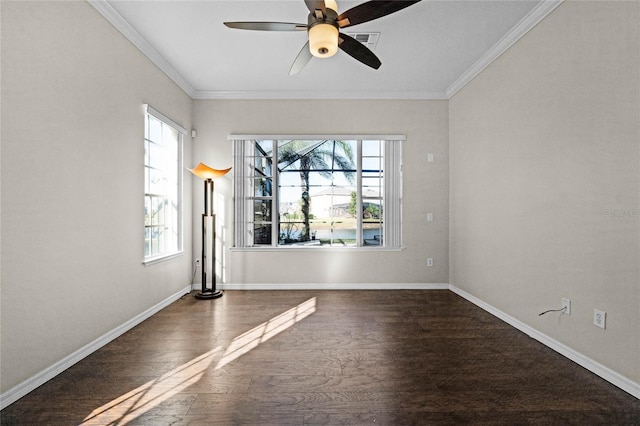 1108 Darnaby Way, Orlando, FL 32824 - unfurnished room featuring plenty of natural light, ornamental molding, and dark wood-style flooring