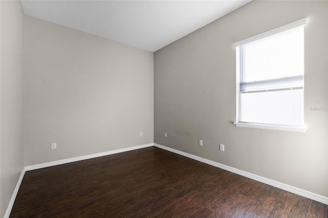 1108 Darnaby Way, Orlando, FL 32824 - unfurnished room featuring baseboards and dark wood finished floors