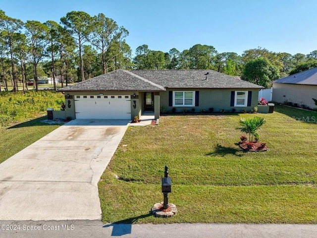 single story home featuring a front lawn, driveway, an attached garage, and stucco siding