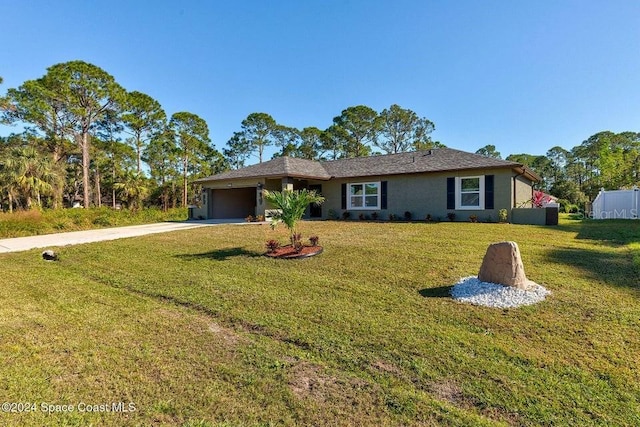 ranch-style home with a front lawn, driveway, and an attached garage