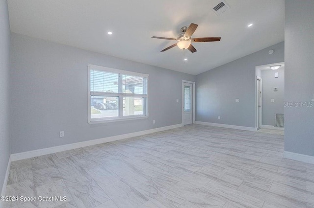 spare room featuring visible vents, baseboards, ceiling fan, vaulted ceiling, and recessed lighting