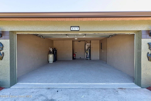 garage with gas water heater