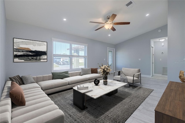 living area featuring visible vents, baseboards, ceiling fan, vaulted ceiling, and recessed lighting