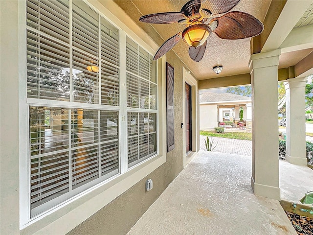 view of patio / terrace featuring covered porch and ceiling fan