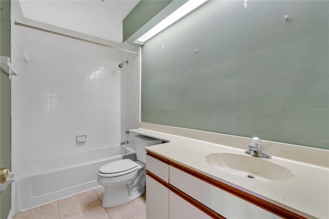 full bathroom with tile patterned flooring, vanity, toilet, and tiled shower / bath