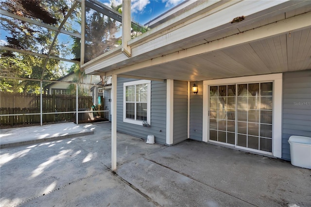 view of patio / terrace with glass enclosure