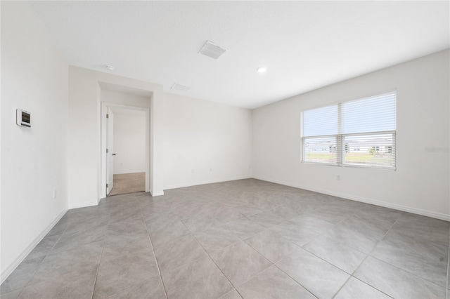 view of tiled spare room