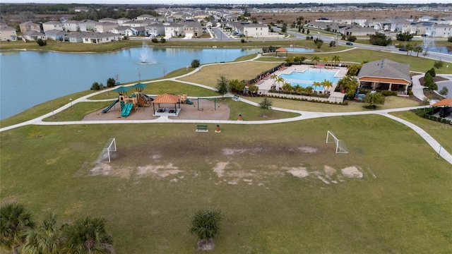 bird's eye view with a water view