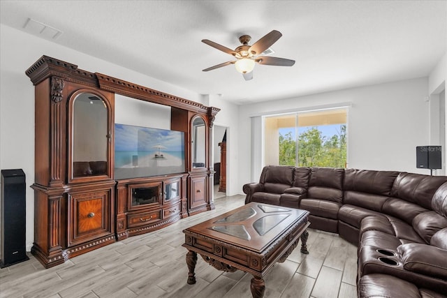 living room featuring ceiling fan