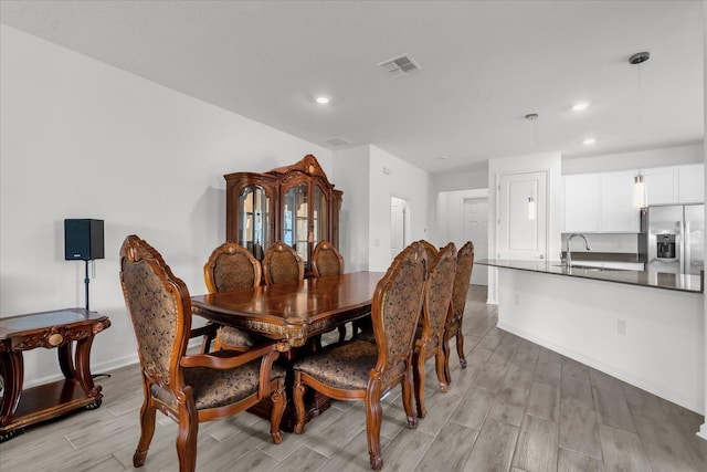 dining space with sink