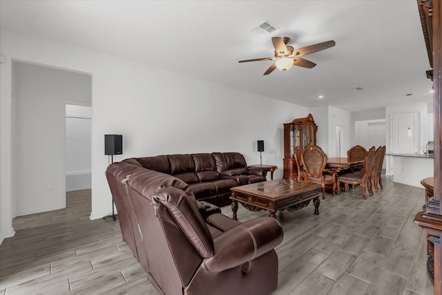 living room featuring ceiling fan