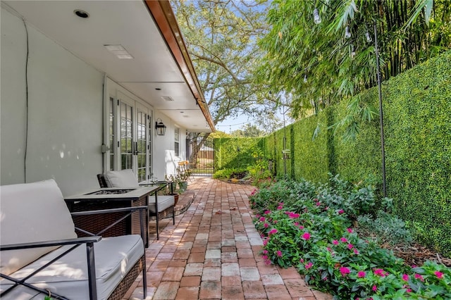 view of patio featuring french doors