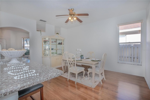 dining room featuring ceiling fan and light hardwood / wood-style flooring