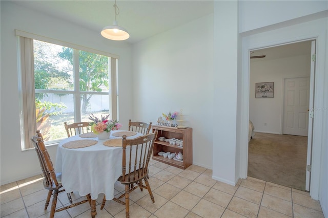 view of carpeted dining space