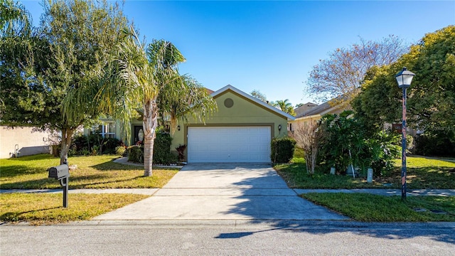 view of front facade with a front lawn and a garage