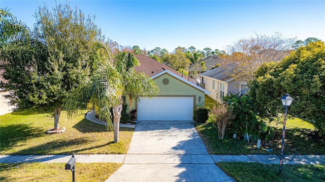 view of front facade with a front lawn and a garage