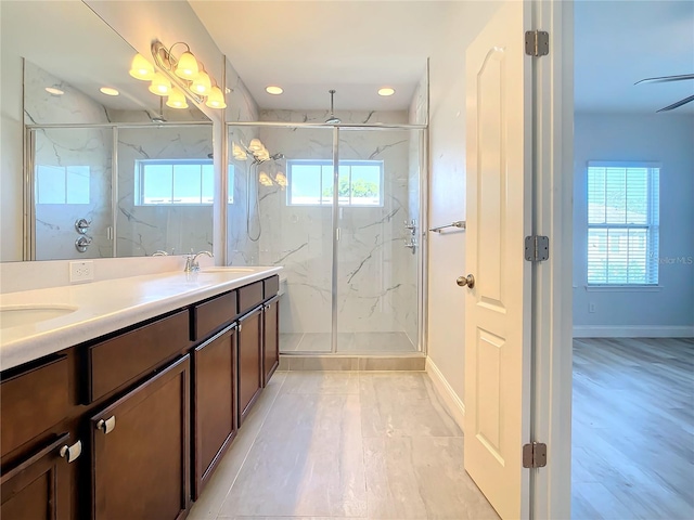 bathroom featuring vanity and walk in shower