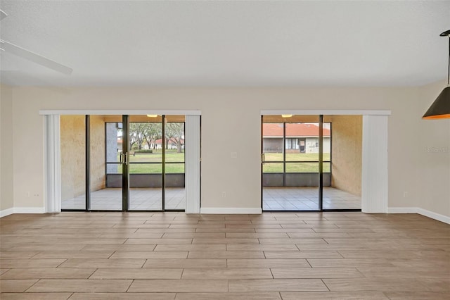 unfurnished room with plenty of natural light