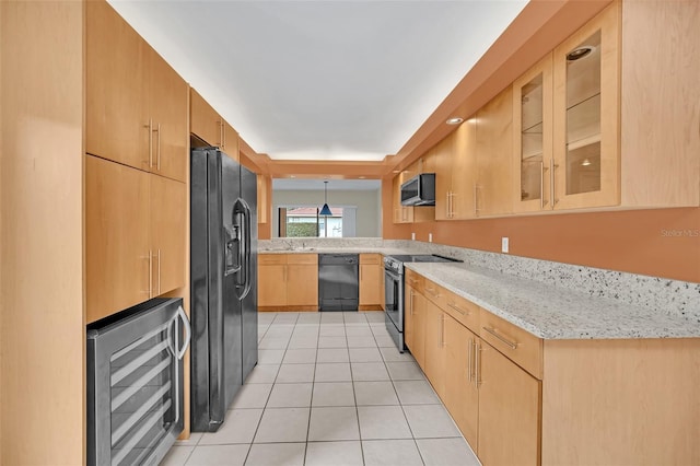 kitchen featuring light tile patterned floors, black appliances, light brown cabinetry, decorative light fixtures, and beverage cooler