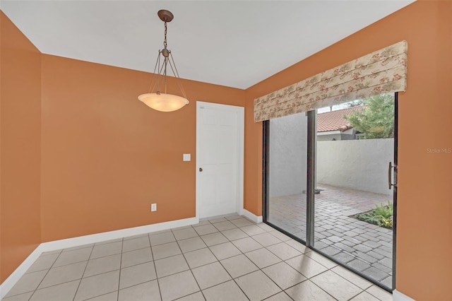 view of tiled spare room