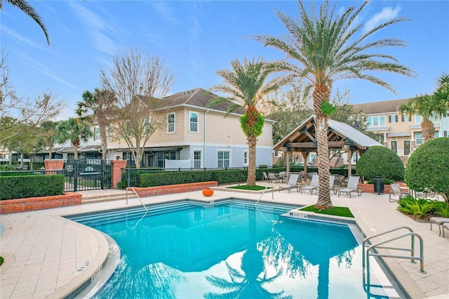 view of pool with a gazebo and a patio