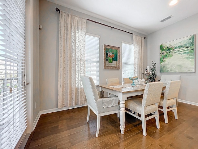 dining area featuring hardwood / wood-style floors