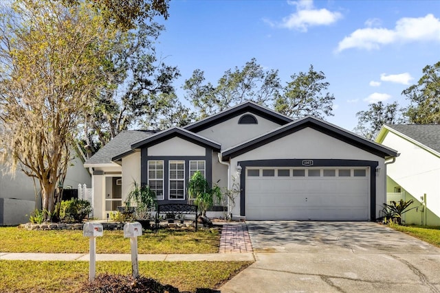 ranch-style house featuring a garage