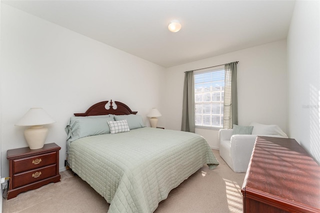 bedroom with light carpet