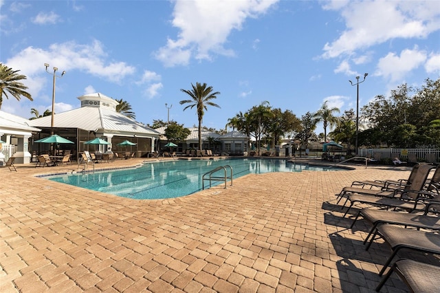 view of swimming pool featuring a patio