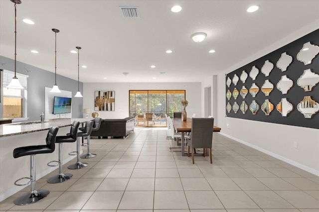 dining room with light tile patterned floors