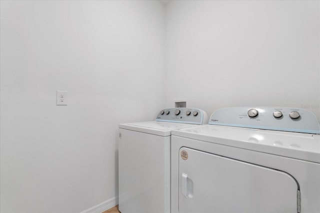 laundry room with washer and clothes dryer