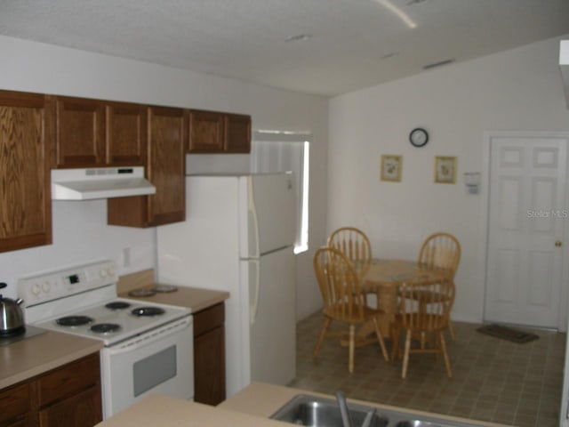 kitchen featuring white electric range oven