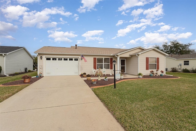 ranch-style home with a garage and a front yard