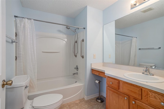 full bathroom with shower / tub combo, tile patterned flooring, toilet, a textured ceiling, and vanity