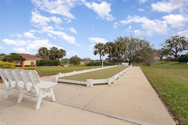 view of home's community featuring a yard