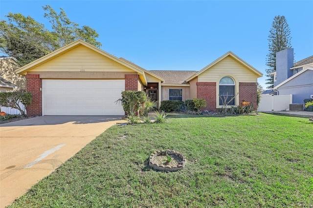 single story home with a garage and a front yard