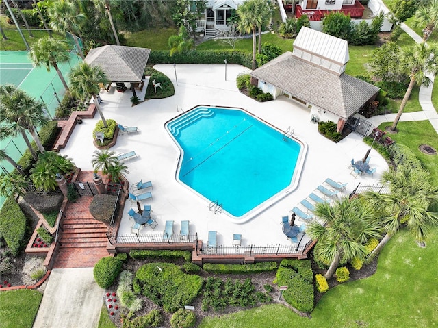 view of swimming pool with a gazebo and a patio area