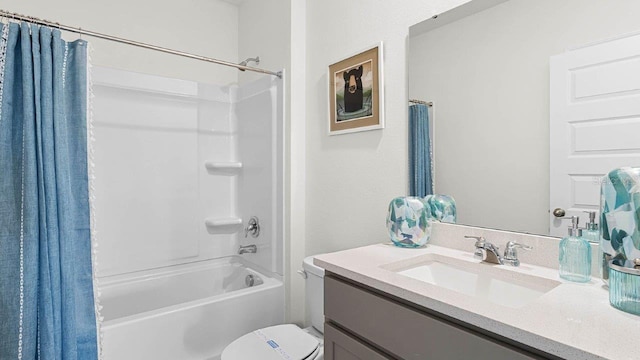 full bathroom with vanity, toilet, and shower / bath combo with shower curtain