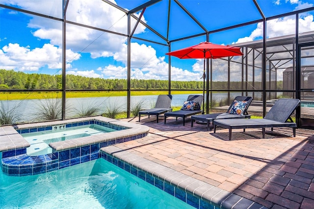 view of swimming pool featuring a lanai, a water view, an in ground hot tub, and a patio