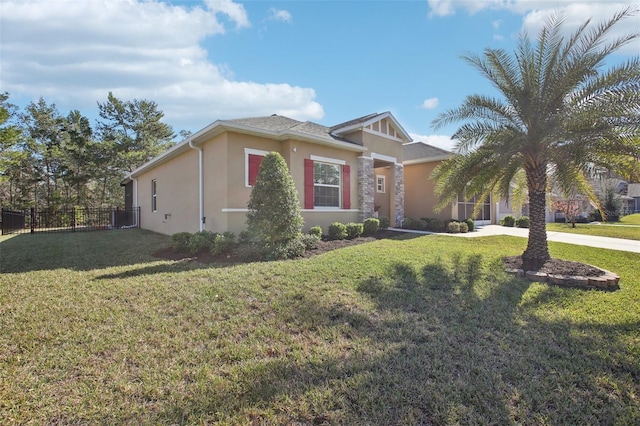 view of front facade featuring a front yard