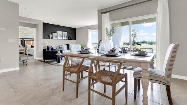 dining space with light tile patterned flooring