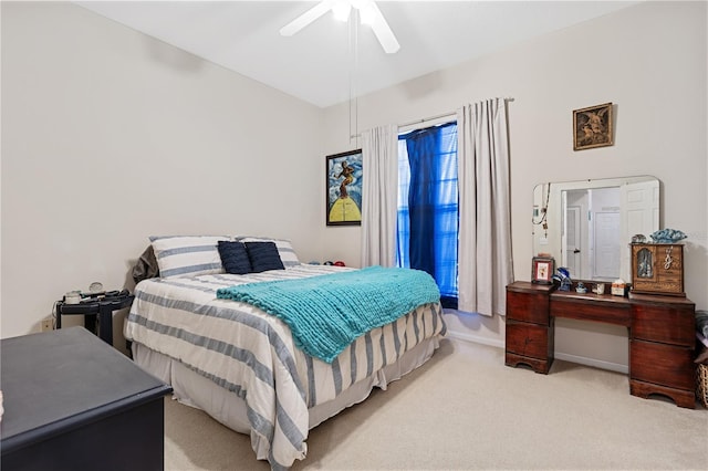 bedroom with light colored carpet and ceiling fan