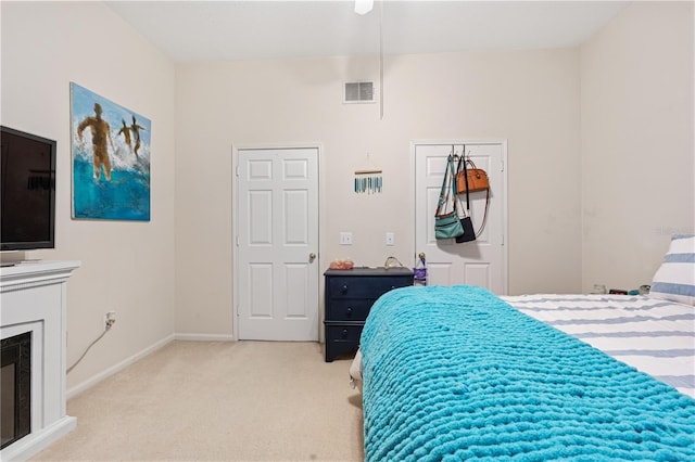 bedroom with light carpet