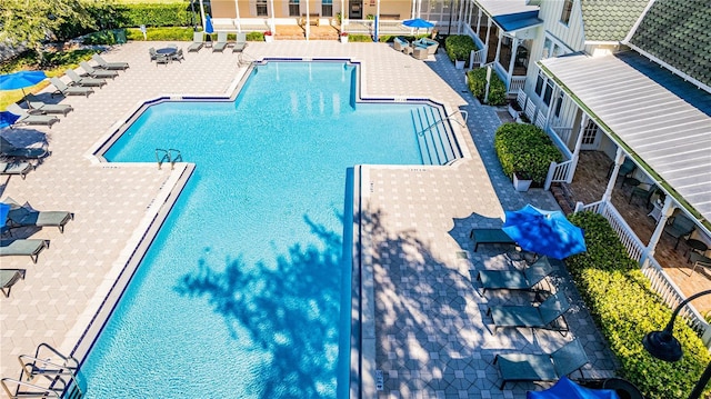 view of pool featuring a patio area