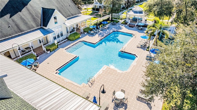 view of swimming pool featuring a patio