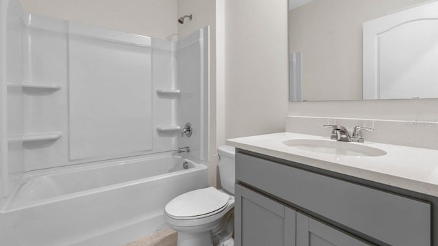 full bathroom with shower / bathing tub combination, vanity, and toilet