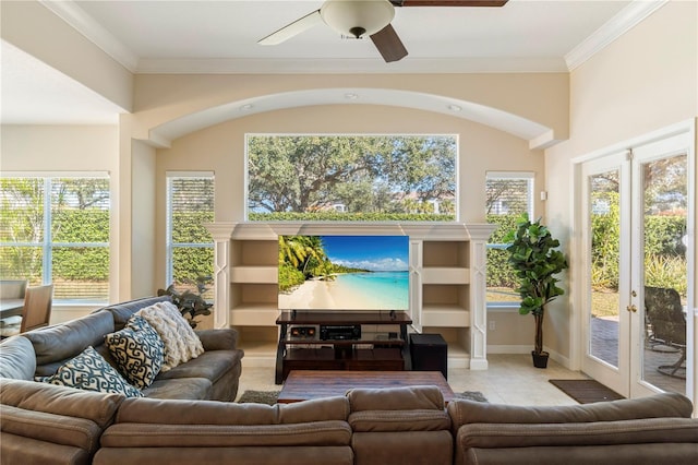 sunroom featuring french doors and ceiling fan