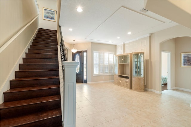 staircase with tile patterned flooring